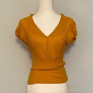 Moth sweater knit top in mustard yellow